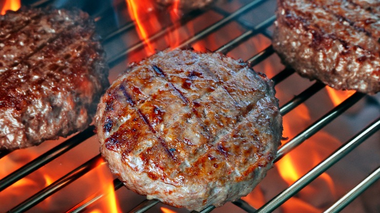 burger patties on a grill