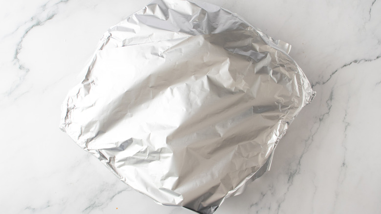 foil-covered pan on a kitchen counter