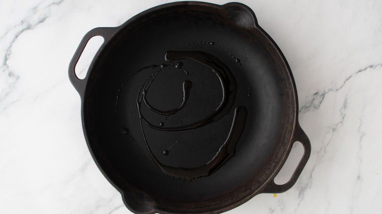 oil in a black frying pan