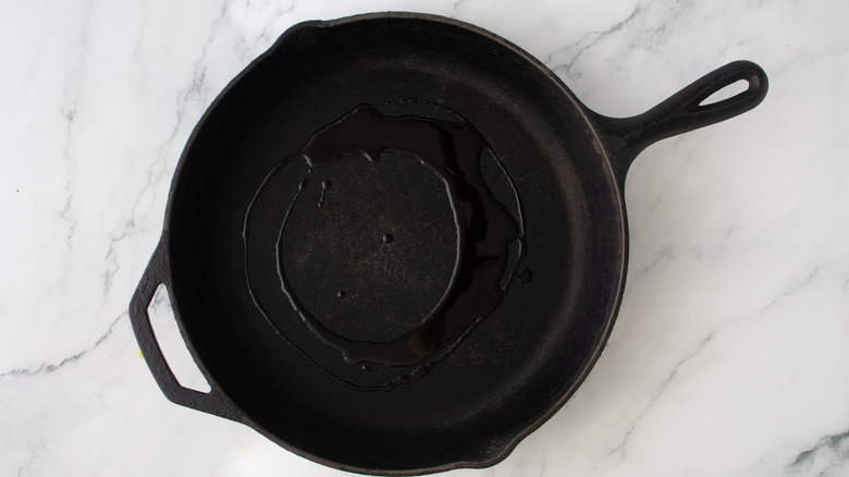oil in a black frying pan
