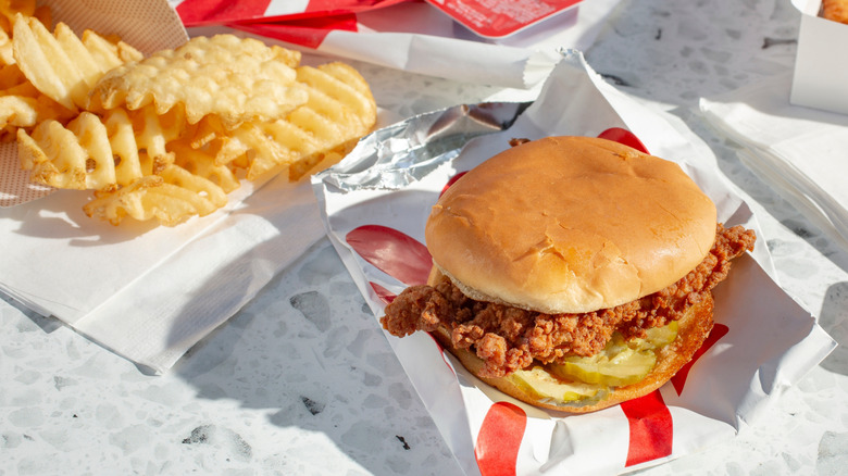 A burger with waffle fries