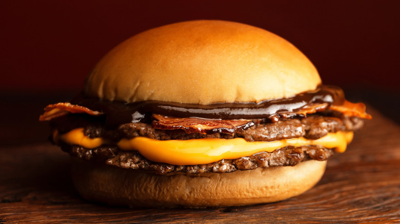 Bacon smash burger with cheese and barbecue sauce