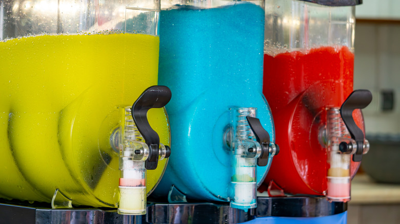 Frozen drink machines hold brightly colored contents