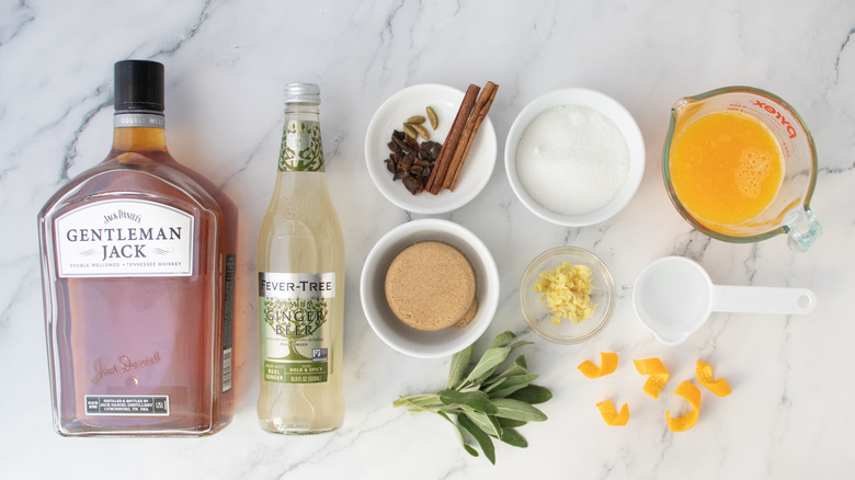 whiskey, ginger beer, orange juice, sugar, and seasonings