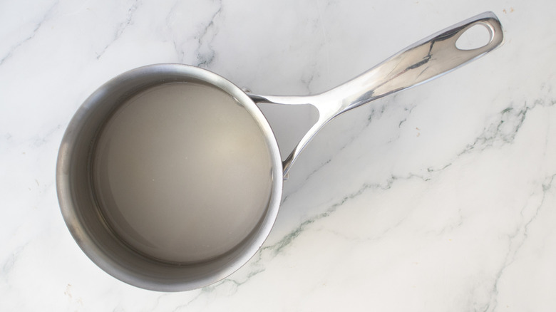 water and sugar in a saucepan