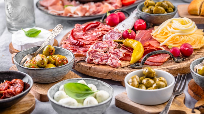 Various meats, cheeses, and vegetables