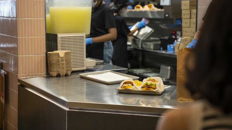 a burger and fries in a fast food restaurant