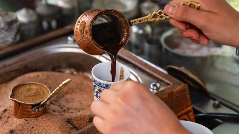 pouring Turkish coffee