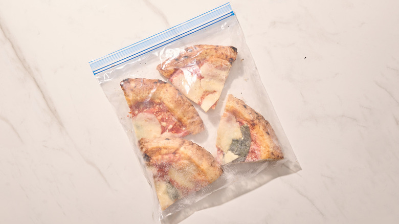 frozen pizza in a plastic bag