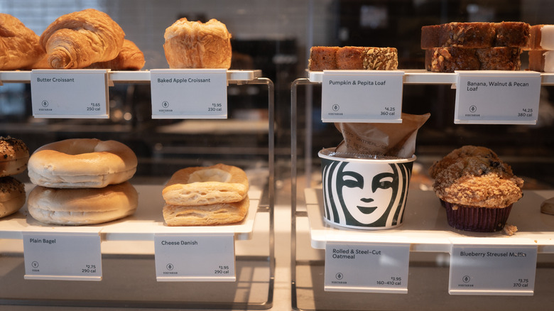 Starbucks display case with food in it