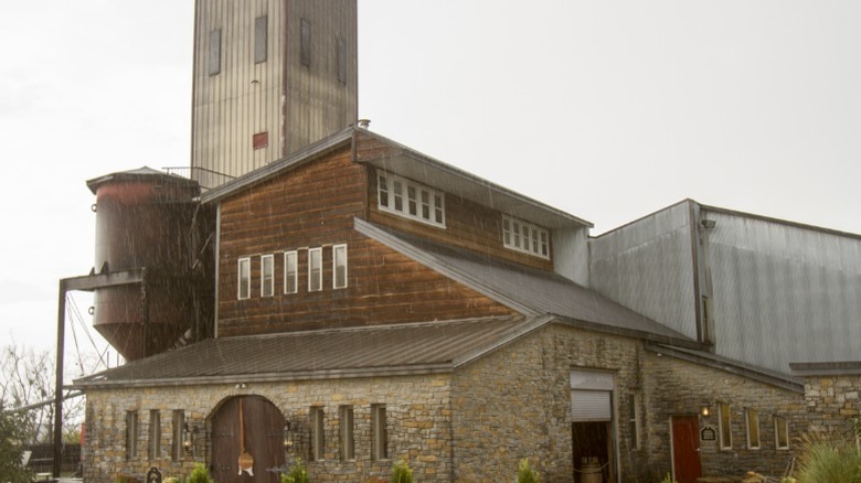 The historic Willett Distillery  building in Old Bardstown, Kentucky on a rainy day.