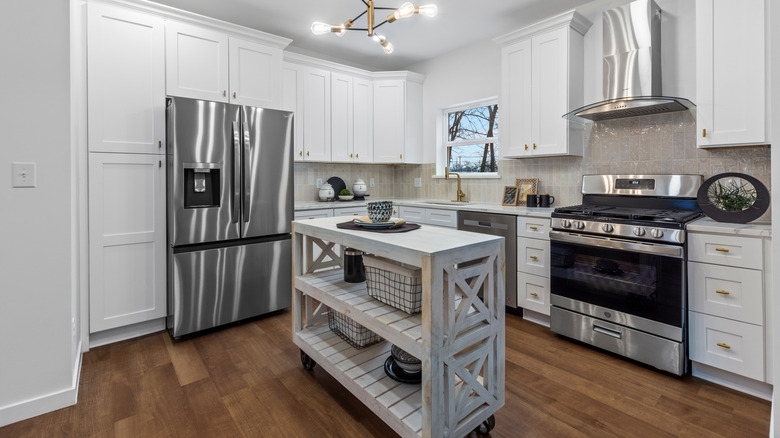 Kitchen with rolling kitchen island
