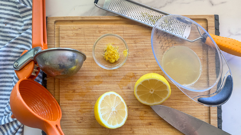 cut lemons and zest on board