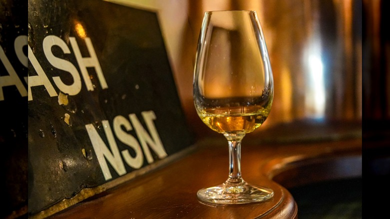 A Copita glass with scotch