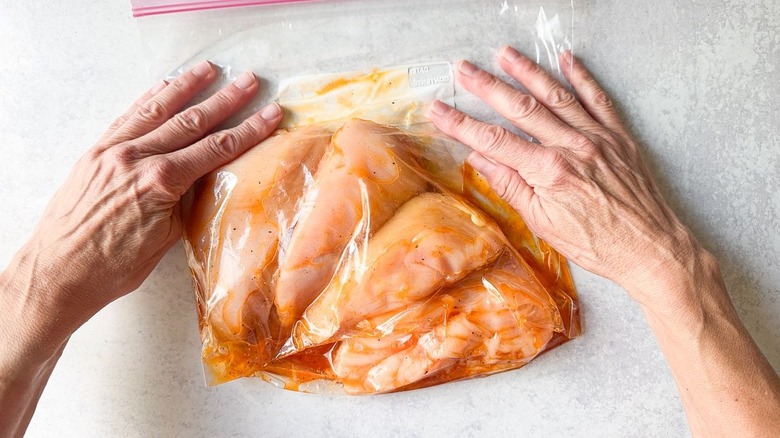 Marinated chicken breasts in ziplock bag