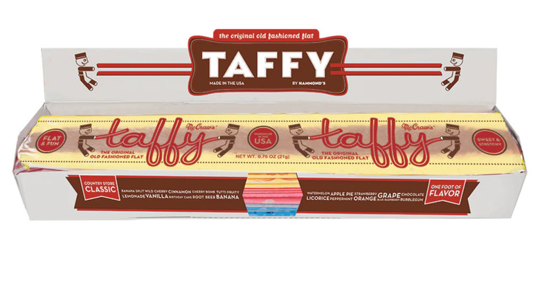 A box of McCraw's Flat Taffy, sold by Hammond's, features the words "the original old fashioned flat," "Made in the USA," and "country store classic," along with a listing of about 20 flavors. The package also displays graphics of workers hand-pulling the treat.