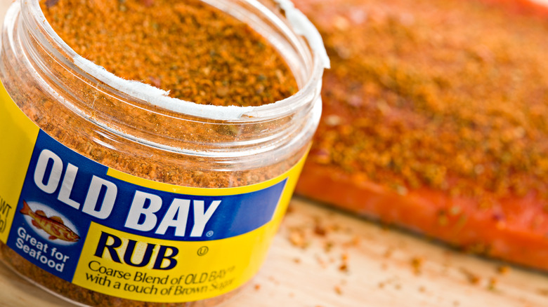 An open jar of Old Bay seasoning