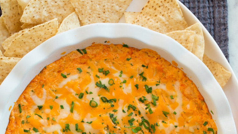Super Bowl Buffalo Chicken Dip close up with tortilla chips.
