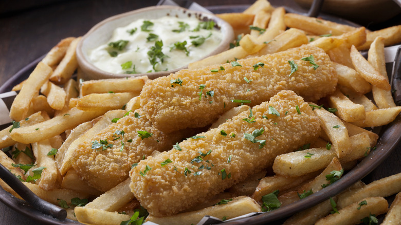 Fish sticks and fries with seasonings