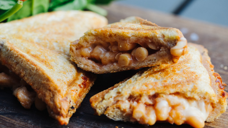 Toasted baked bean sandwiches.