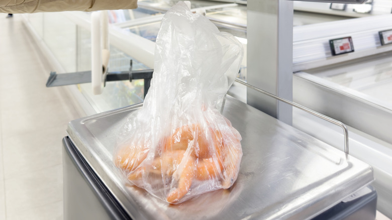 A bag of shrimp at the grocery store.