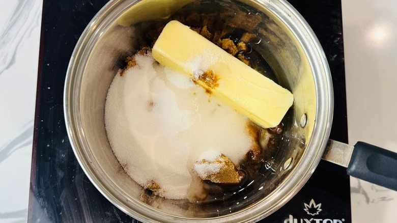 Butter and sugars in saucepan