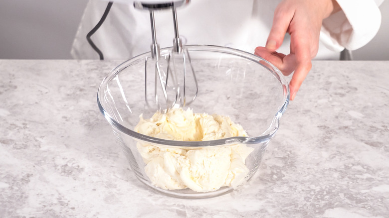 Whipping frosting with hand mixer