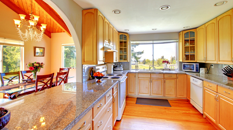 kitchen with wooden arched cabinets