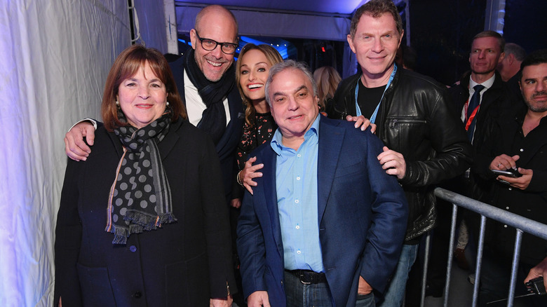 Alton Brown, Ina Garten, Bobby Flay, and Gia De Laurentiis at a public event
