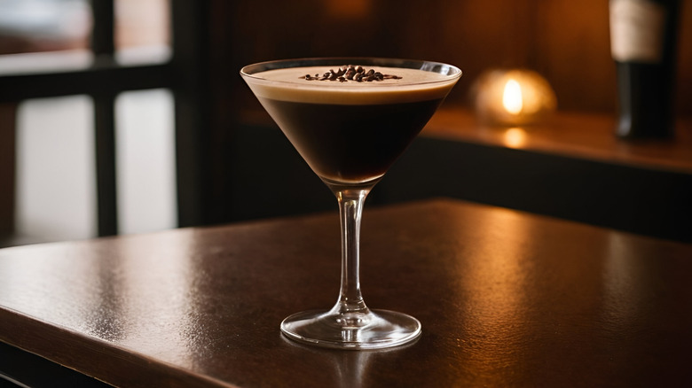 espresso martini on a wooden bar top