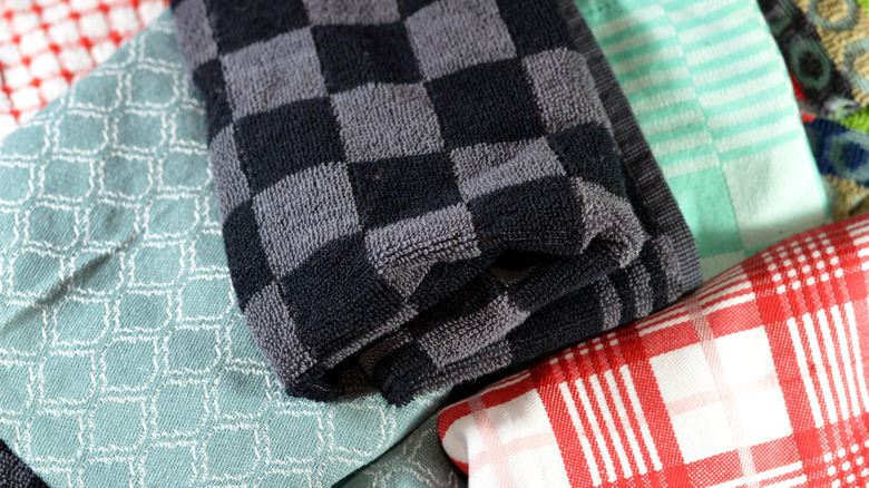 close up of colorful folded kitchen towels
