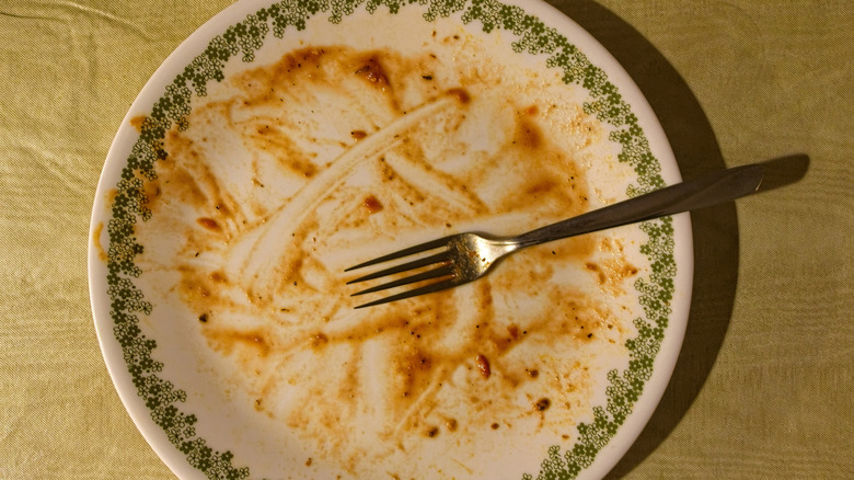 Finished plate on a table with a fork