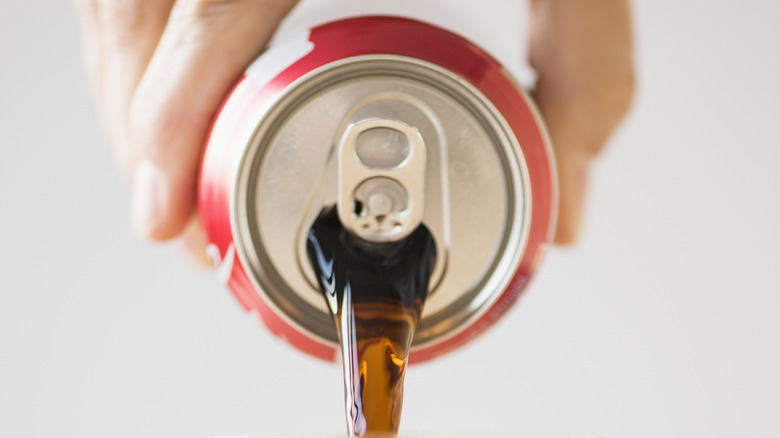 Pouring Coca-Cola from can