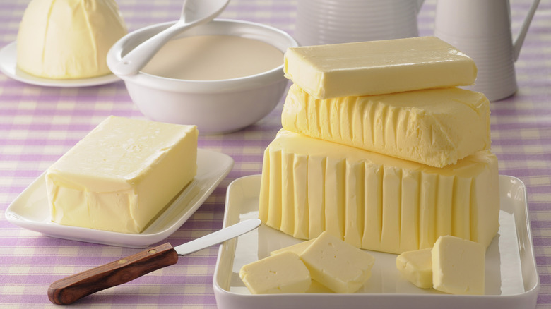 Butter dishes full of butter