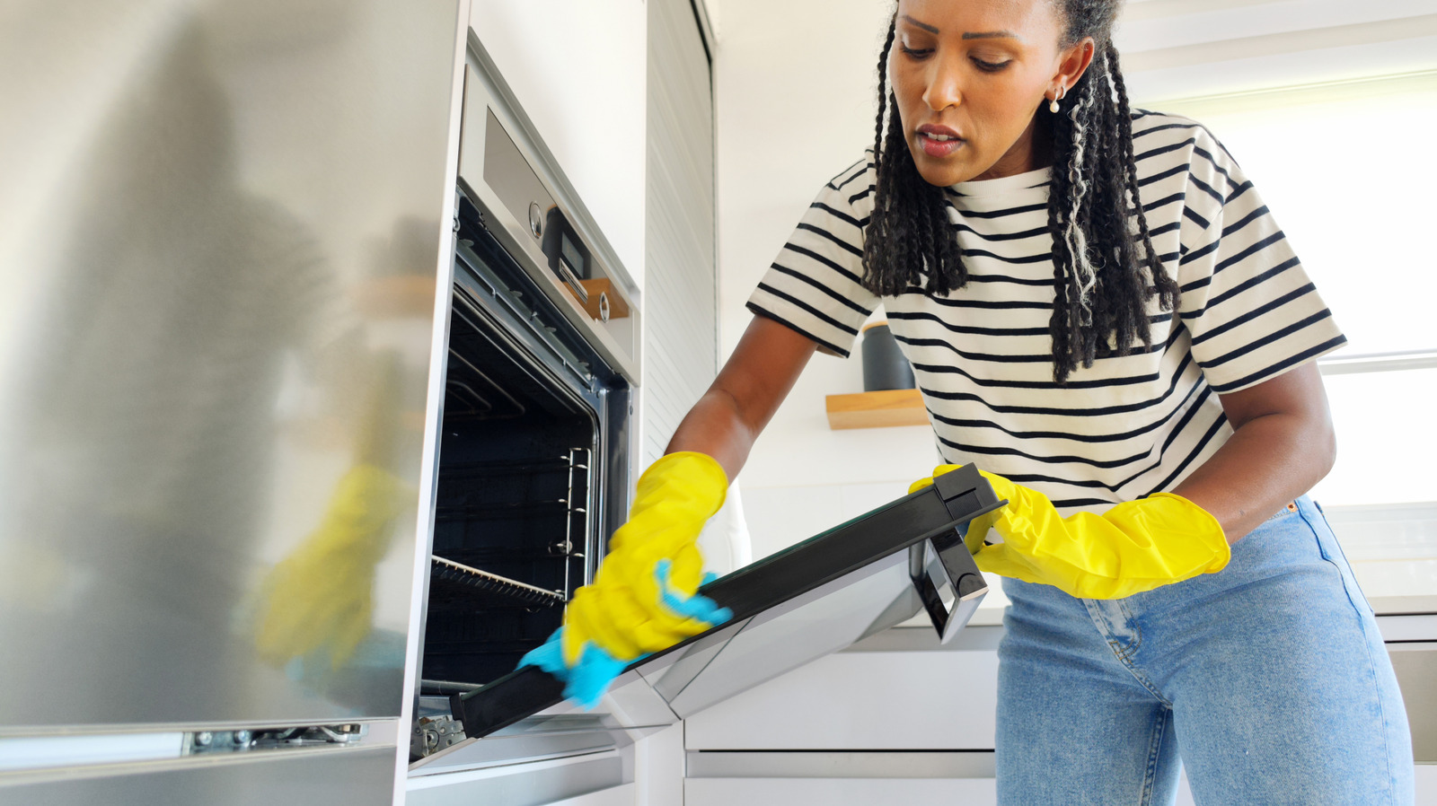 Tips For Cleaning Underneath Large Kitchen Appliances (Without Moving Them)