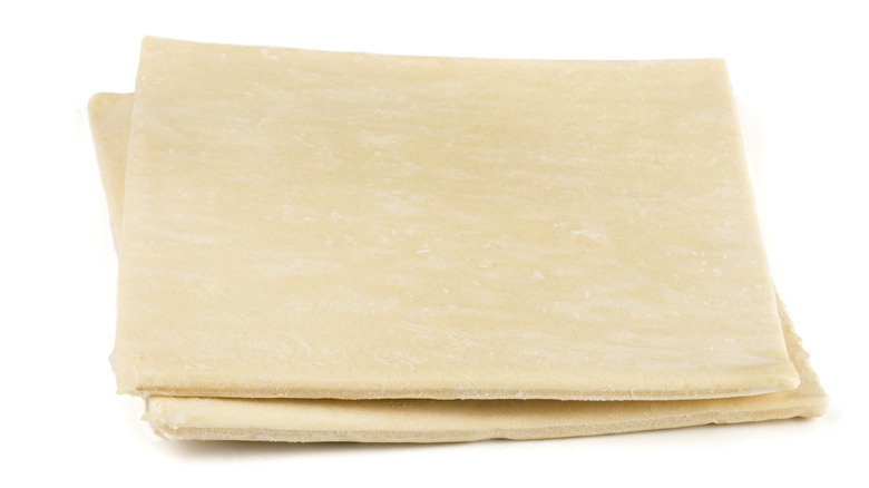 frozen puff pastry on white background