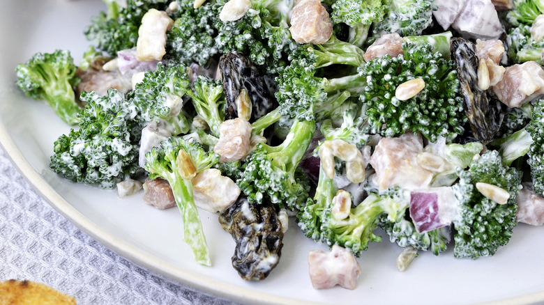 Broccoli salad with raisins, onions, and sunflower seeds