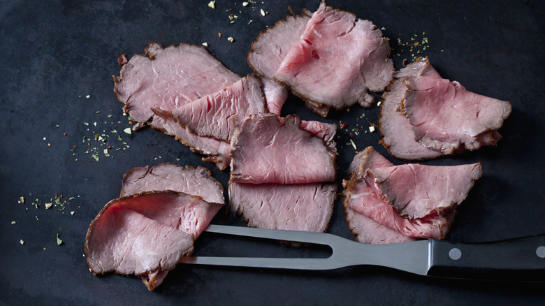 A close-up of roast beef slices