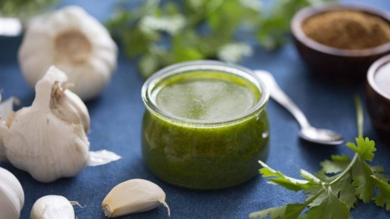 Green marinade and garlic bulbs