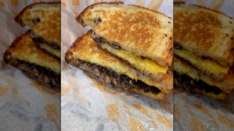 Culver's grilled cheese with added burger bun inside of packaging