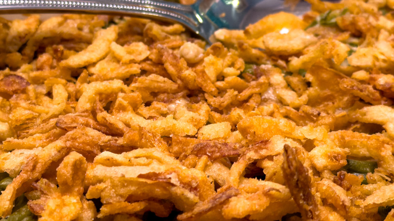 Close up of fried onions on a green bean casserole