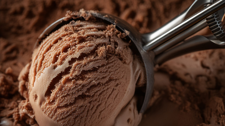 Chocolate ice cream being scooped