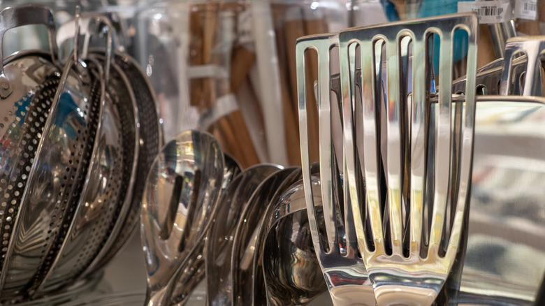 metal fish spatula with other utensils
