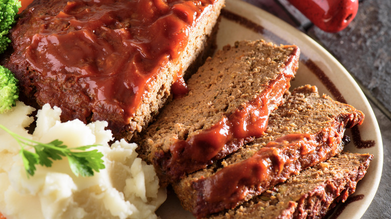 Closeup of meatloaf with mashed potatoes