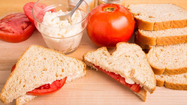 Ingredients and preparation for a tomato sandwich