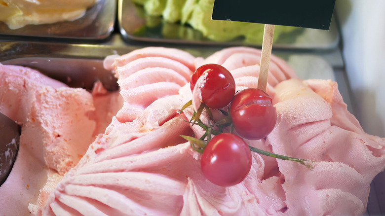 Pink tomato ice cream topped with cherry tomatoes