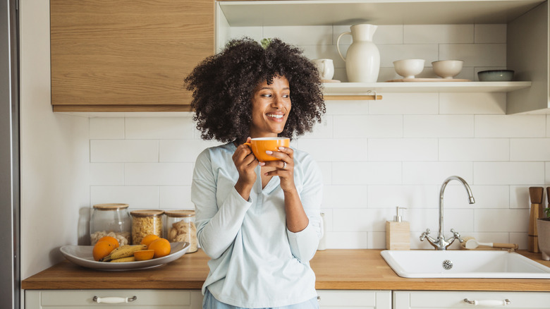 Person with their morning cup of coffee