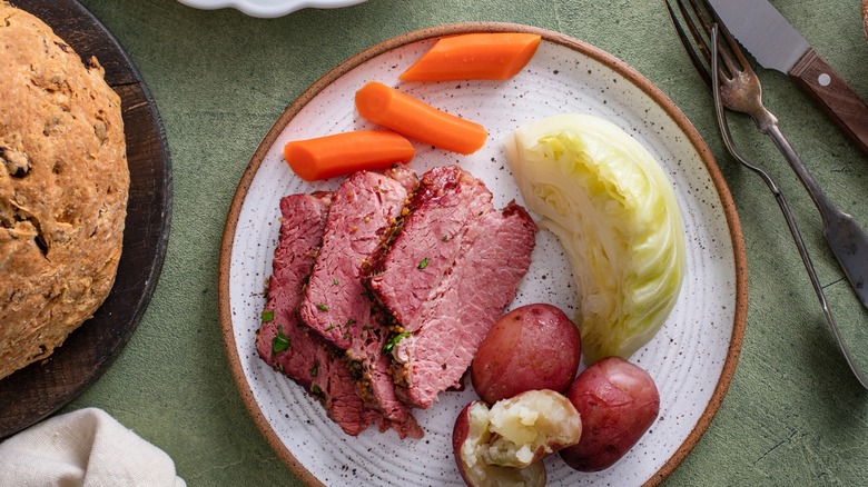 Spread of St. Patrick's Day food with bread on the side.
