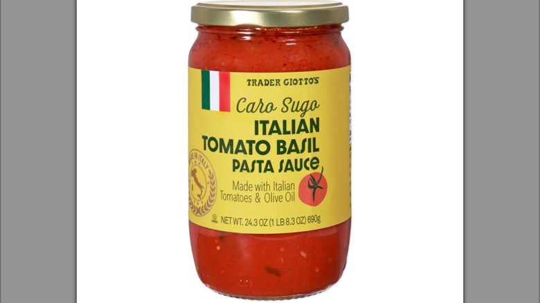 Glass jar of Trader Joe's Caro Sugo Italian Tomato Basil Pasta Sauce