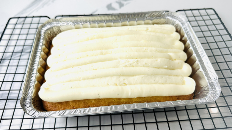 Frosting piped over cooled mini sheet cake